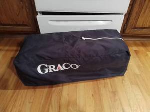 lot 5023 image: Graco Portable Crib