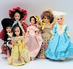 lot 7031 image: (6) Vintage Mid-Century Hard Plastic Dolls with Crochet Dresses  more