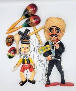 lot 7060 image: (2) Wooden Marionettes - Pinocchio and a Mariachi  Maracas