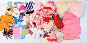 lot 7073 image: Huge Lot of Variety of Doll Items - Vintage Bottles, Clothing, Furniture, Hair Accessories, Bedding  (4) Doll Sleeping Bags