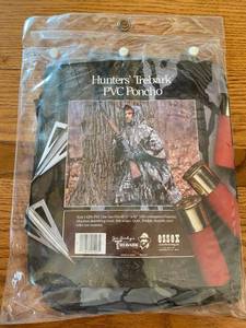 lot 5128 image: PVC Hunters Camouflage Poncho - New in Package - Tree bark look