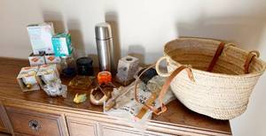 lot 5141 image: Nice Large Woven Basket w Leather Straps, WOK Cooking Utensils, Misc Pottery and NEW light bulbs and More