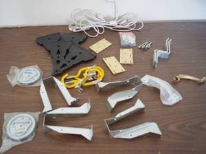 lot 5018 image: Lot of Brackets, Hinges, Hooks, Handles, Screws and an extension cord w an office trash can