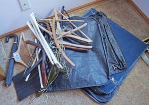 lot 5210 image: Lot of Hanging Clothes Travel Bags, Umbrella, Wood Hangers, Metal Hangers and more
