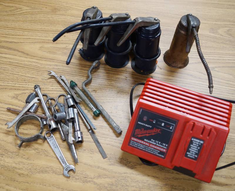 lot 97714 image: Lot of Misc. Items - Oil Gun, Milwaukee Universal Charger, and More...