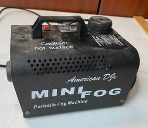 lot 8253 image: Commercial American DJ Mini Fog Portable Fog Machine