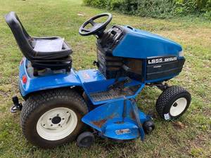 lot 99047 image: New Holland Riding Yard Tractor Lawnmower LS55-19H Motor M# CV20S - See Videos - Check out that hitch