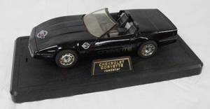 lot 93006 image: Collectible Black Die Cast, Chevrolet Corvette Roadster Car