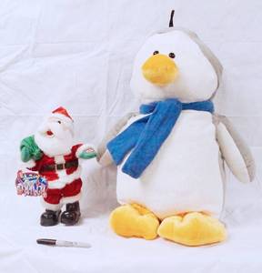 lot 93014 image: Stuffed Animals - Large Penguin and Dancing Santa