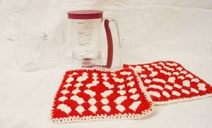 lot 93041 image: Pyrex Glass Measuring Glass, Pancake or Funnel Cake Measurer and Pourer, and Pot Holders