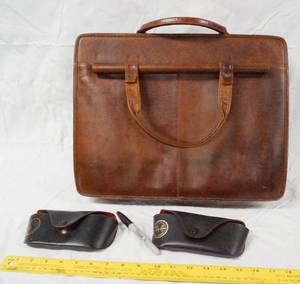 lot 93059 image: Wilsons Leather Briefcase & (2) Empty Ray-Ban Glass Cases