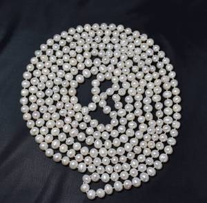 lot 12 image: Infinity Pearl Necklace with Cushioned Pouch