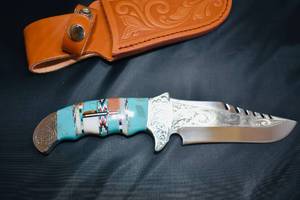 lot 34 image: Southwestern Multi-stone  Carved Knife with Stamped Leather Sheath