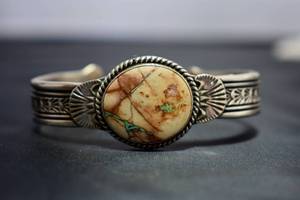 lot 38 image: Royston Turquoise Stamped Cuff by Navajo Artist Garret Hale