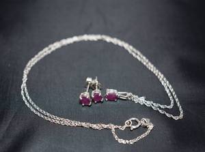 lot 50 image: Sterling Silver Ruby Earrings and Necklace Set