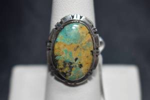 lot 62 image: Navajo Handmade Sterling Silver and Kingman Turquoise Ring by Calvin Spencer