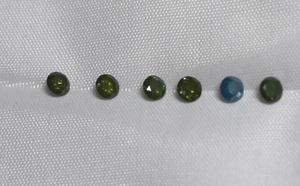 lot 90 image: 1.57 cttw Diamonds, 5 green, 1 blue