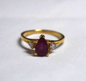 lot 97 image: 1.04ct Pear Shaped Pink Ruby in 14k Yellow Gold with Diamond Accents