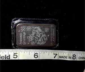 lot 302 image: 1 troy oz .999 Fine Silver Seasons Greetings bar