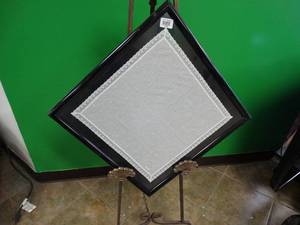 lot 17456 image: Framed B M C Cloth