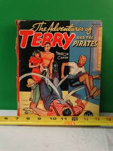 lot 46 image: The Adventures of Terry and the Pirates The Big Book by Milton Caniff