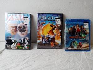 lot 219 image: Two DVDS- Milo and Otis, Pixels, and A Blu-Ray Spiderman Far From Home