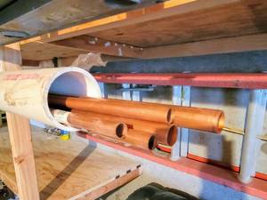 lot 8044 image: (2) Long PVC Pipes  (12) Hard COPPER TUBE Lengths
