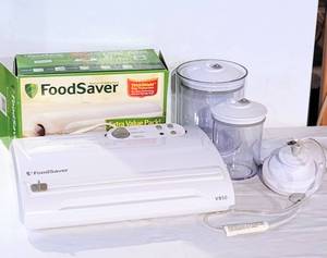 lot 8056 image: FoodSaver V850, (2) Containers with Sealer Lids & hose  Box of FoodSaver Vacuum Storage Bags