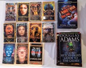 lot 8120 image: (10) Books from the series EverWorld by K.A. Applegate, (2) Books by Eoin Colfer The Hitchhikers Guide to the Galaxy  And Another Thing