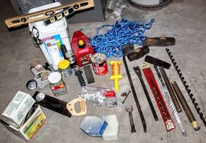 lot 8078 image: Assorted Tools and Hardware Lot Milwaukee Ship Auger Bit, Drill Line Shank, Crow Bars, Heat Bond Tape, Log Splitter Wedge, Paper Taper Machine with Roll, Hand Saw, Werner Extension Ladder Covers & MORE